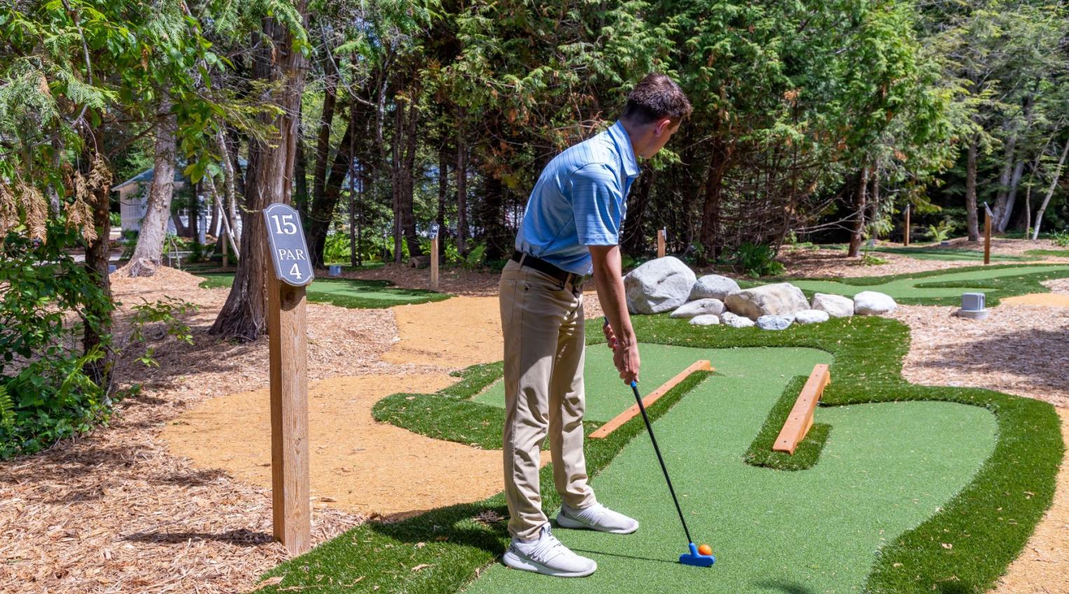 guest playing golf at Grand Hotel Mackinac