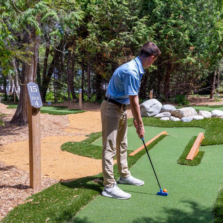 guest playing golf at Grand Hotel Mackinac